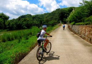 Kristen Biking in Hutong gear