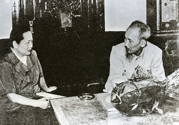Soong Ching-ling, widow of Sun Yat-sen, meets with Vietnamese leader Ho Chi Minh.