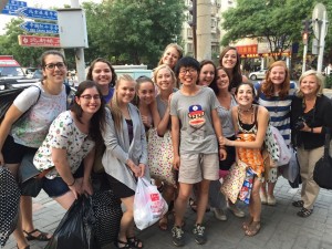 Students from Texas Christian University with The Hutong Education Intern Sunny Gao after a day of commerce in the Central Business District of Beijing.